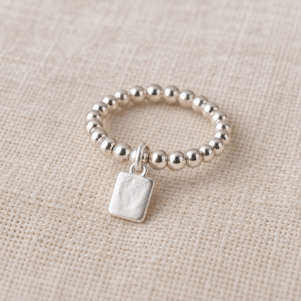 Tag Charm Ring on Elastic